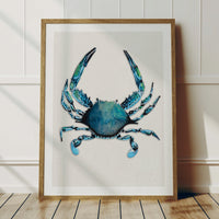 crab painting framed in natural wood frame in a white panelled room