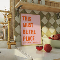 This must be the place, song lyric print, talking heads  lyric print in pink and framed in natural wood.