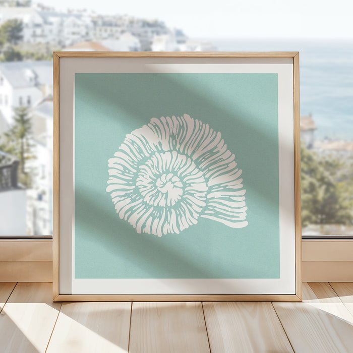 framed shell art print on floor - graphic shell print on aqua blue bacj ground