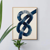 Framed abstract art print of a nautical knot in blue - coastal wall decor