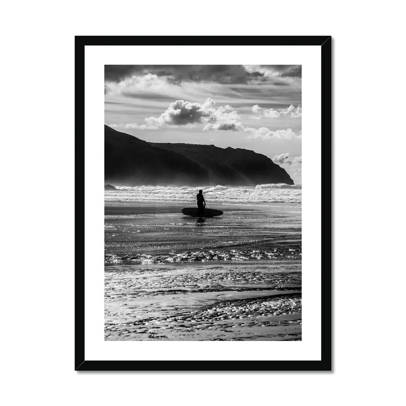 black & white photograph of a surfer on the beach in a black frame- beach house art